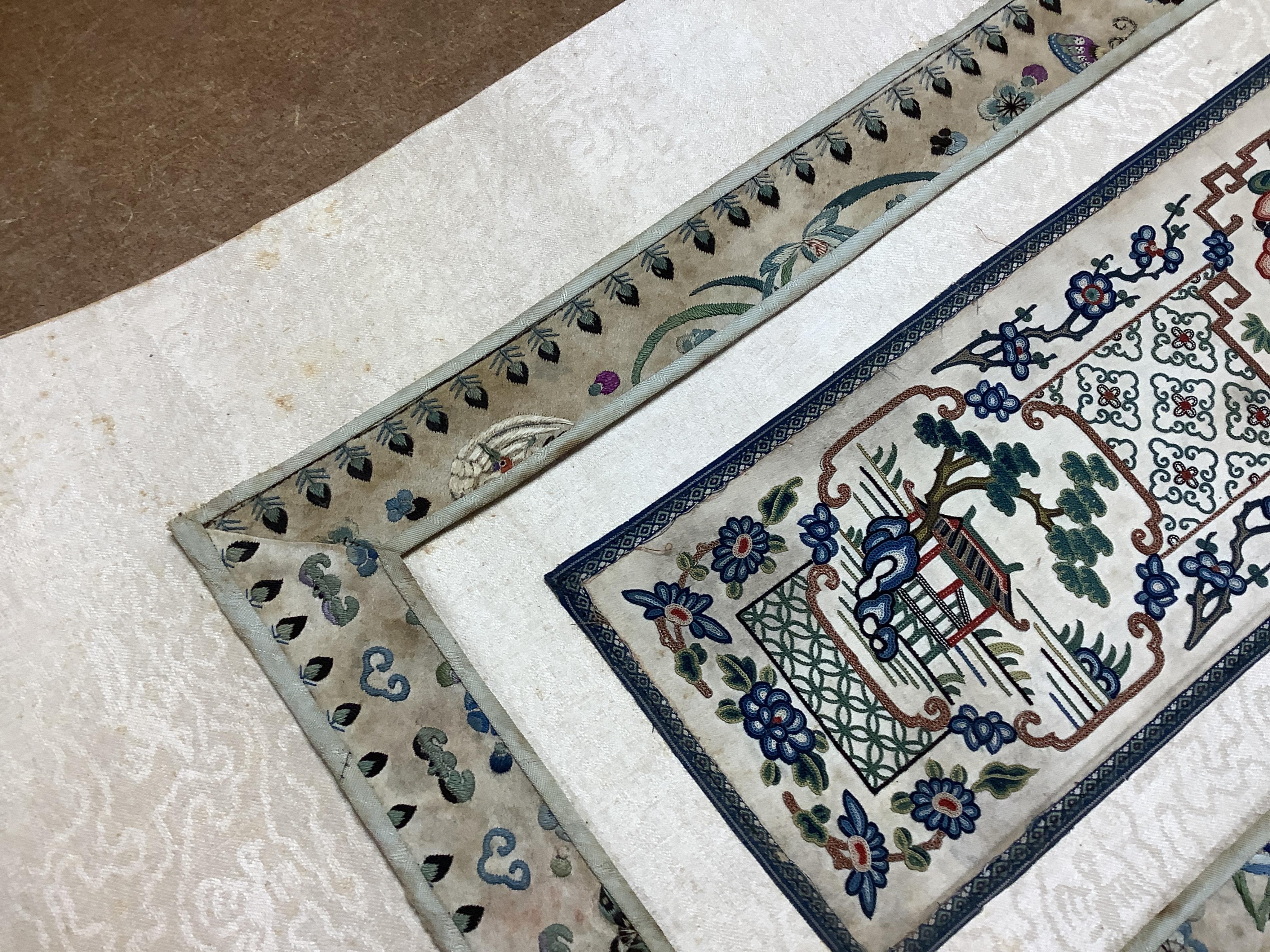 A pair of Chinese silk embroideries, in scroll form